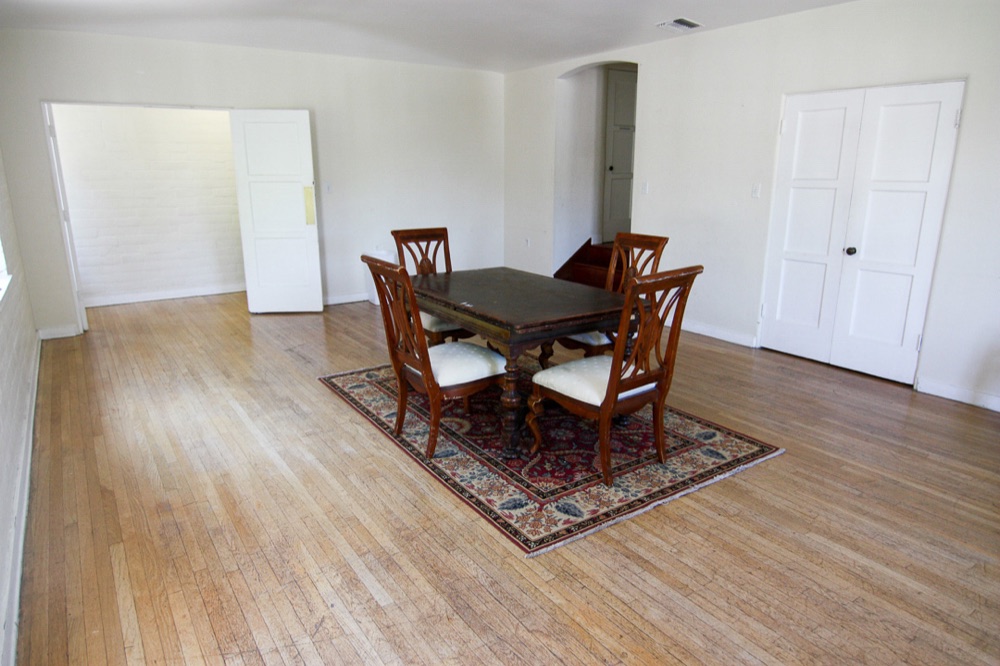 The upstairs meeting space with hardwood floors